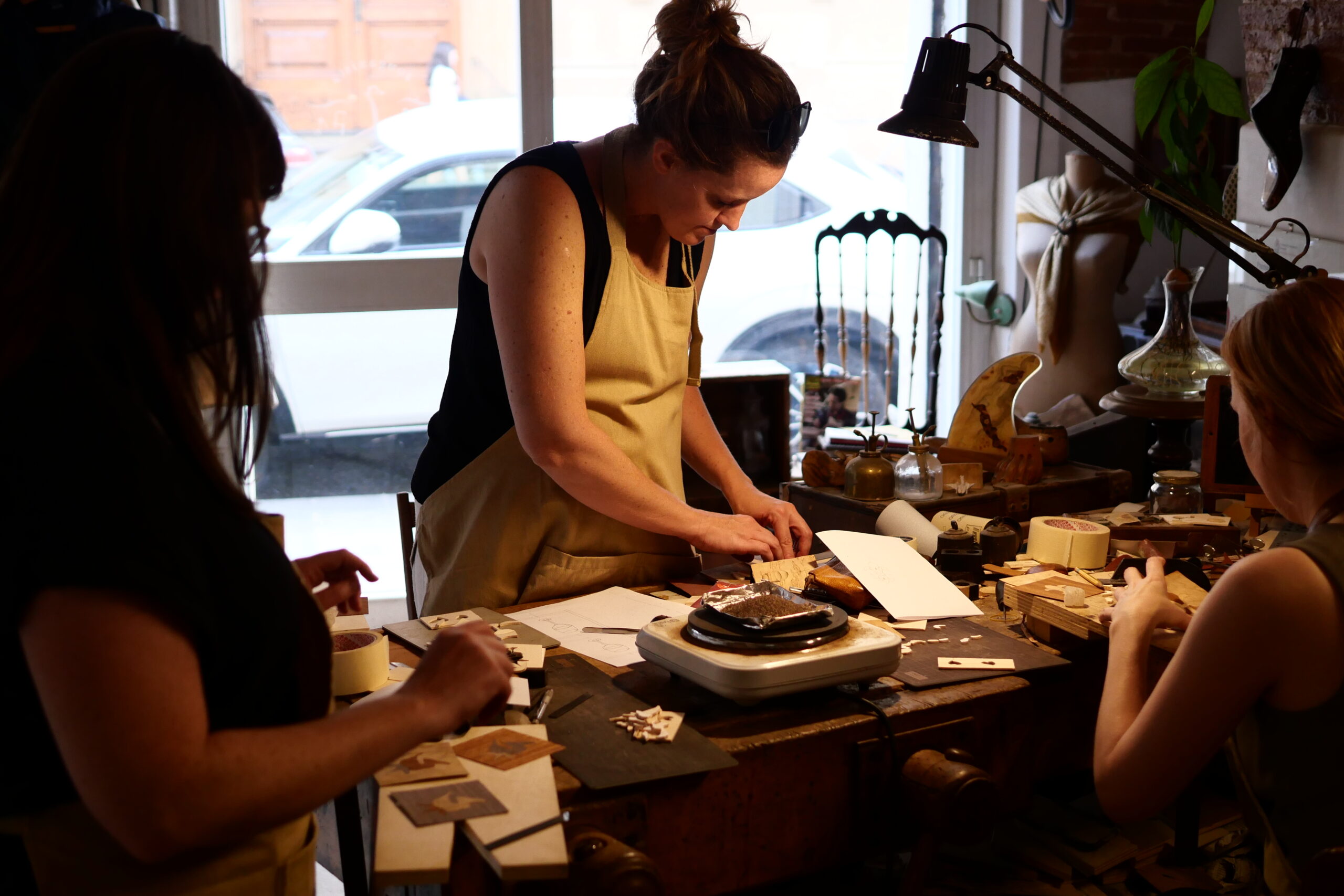 Airbnb Experience: participants choose veneers, cut, assemble, sand shade, and finish a small inlay